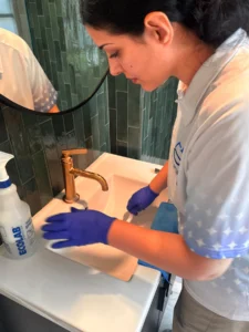 Sygora cleaner cleaning a bathroom sink.